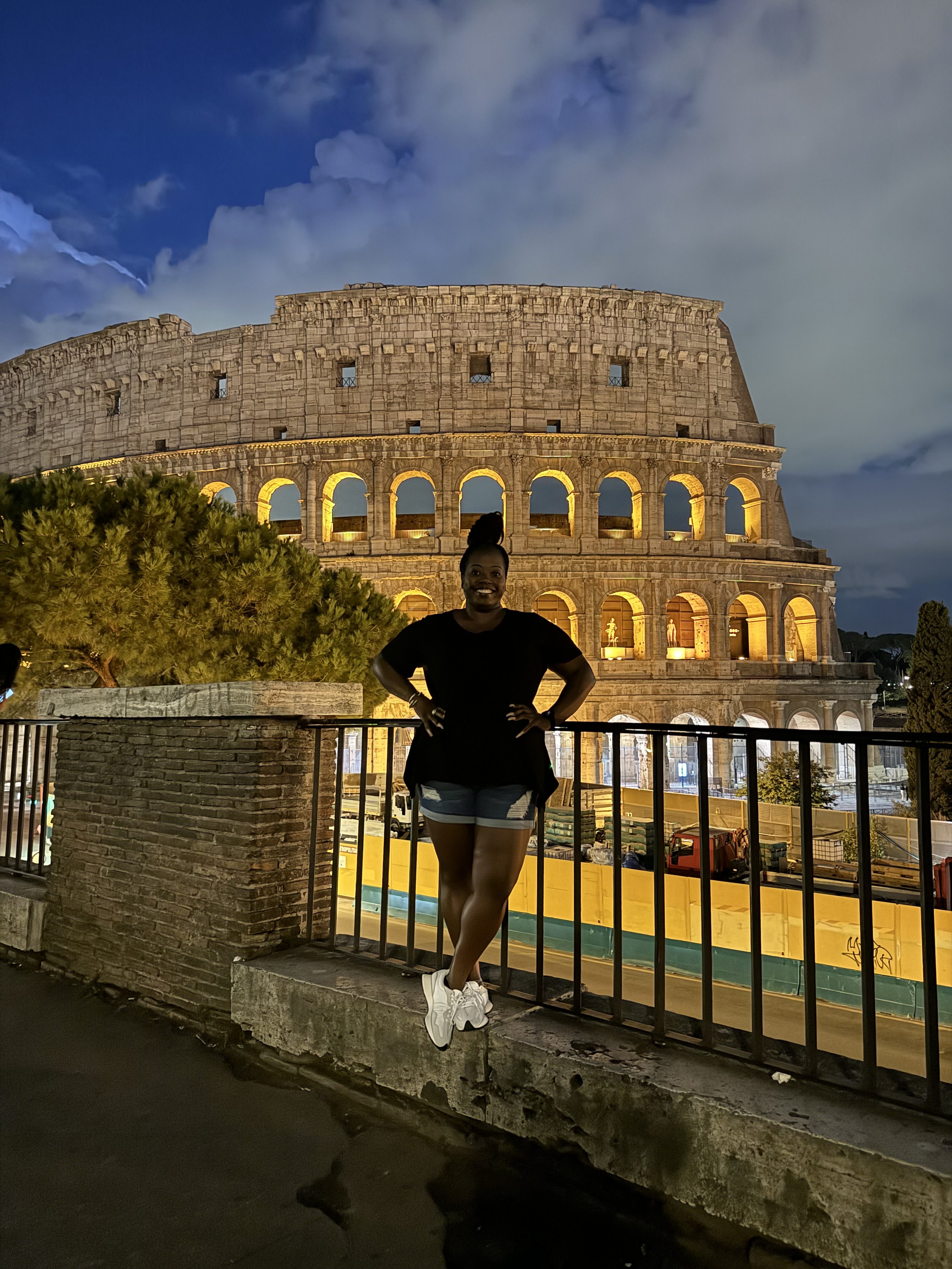 in rome at the colosseum at night.